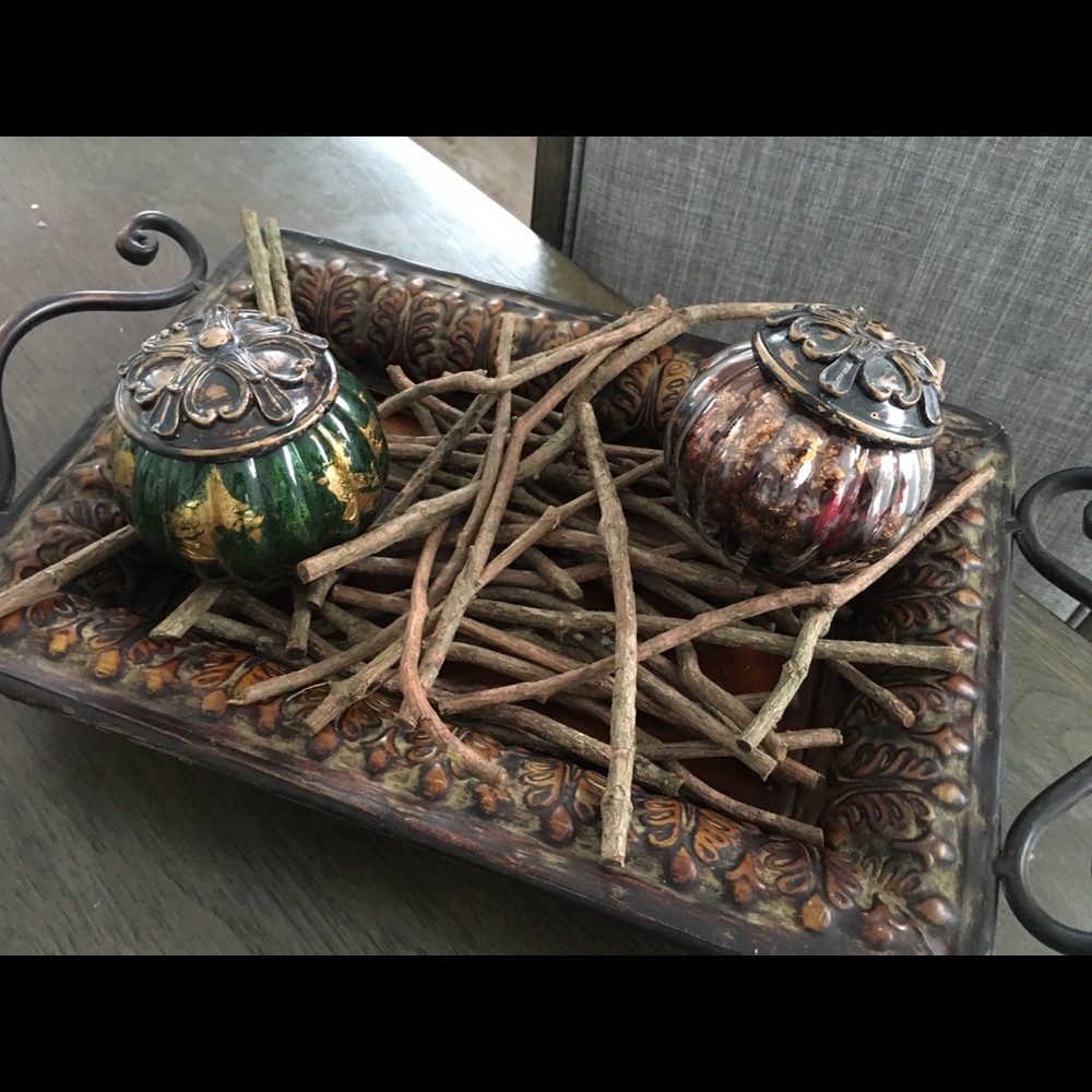 Two glass balls with metal caps